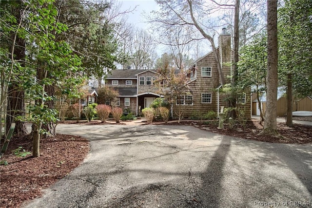 9550 Gee Farm Rd, Gloucester, VA 23061 - shingle-style home with a chimney and driveway