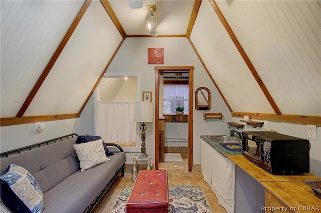 living room featuring vaulted ceiling