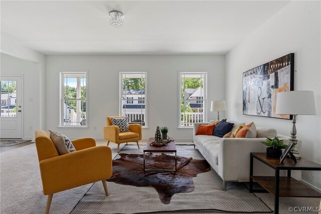 living room featuring plenty of natural light