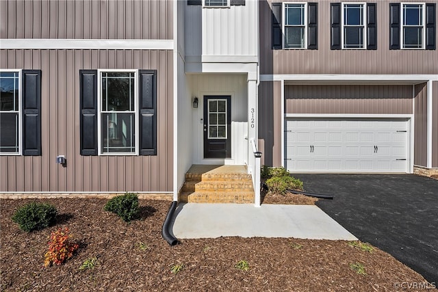 entrance to property with a garage