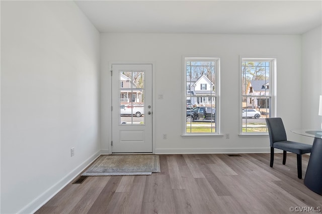 entryway with light wood-type flooring