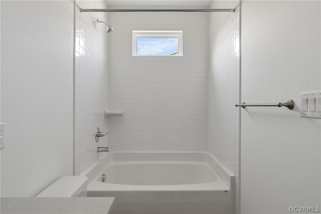 full bathroom featuring vanity, toilet, and tiled shower / bath combo