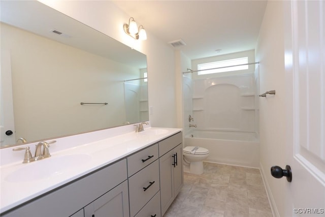 bathroom featuring visible vents, a sink, toilet, and double vanity