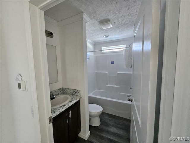 710 Wesley St, Petersburg, VA 23803 - full bath with wood finished floors, toilet, shower / washtub combination, vanity, and crown molding