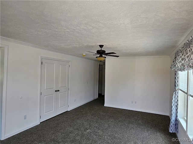 710 Wesley St, Petersburg, VA 23803 - empty room featuring dark carpet, a ceiling fan, a textured ceiling, and crown molding