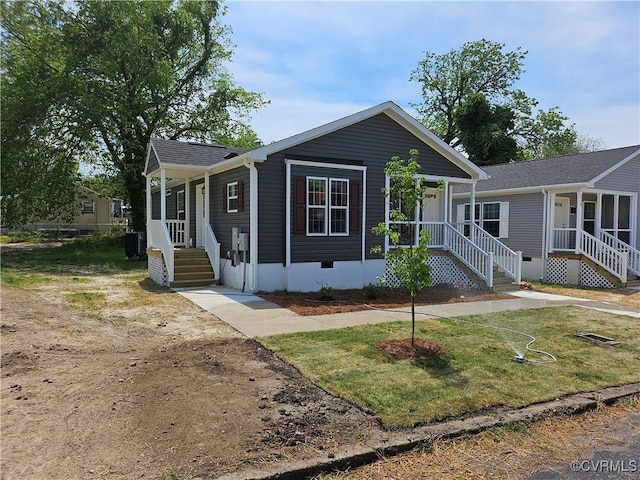 710 Wesley St, Petersburg, VA 23803 - manufactured / mobile home featuring covered porch