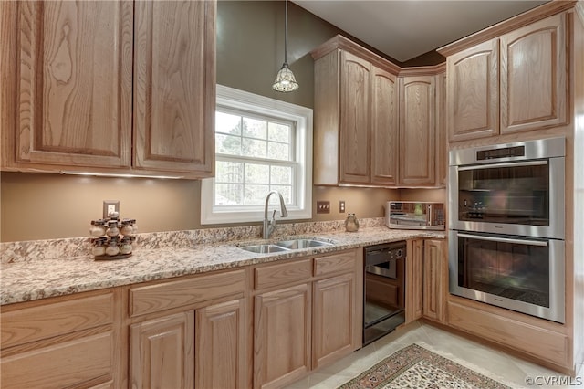 kitchen featuring hanging light fixtures, light stone countertops, dishwasher, sink, and stainless steel double oven