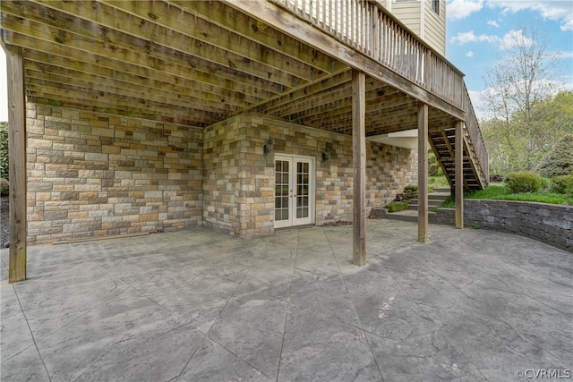 view of patio / terrace featuring french doors and a deck