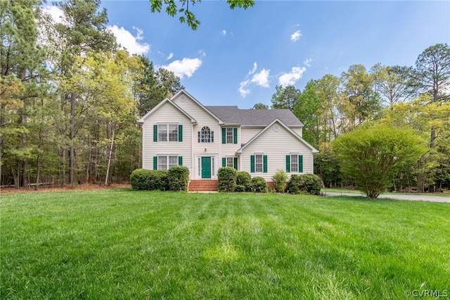 view of front of home featuring a front yard