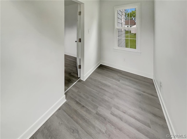 empty room featuring wood-type flooring