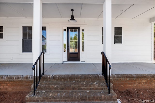 property entrance with a porch