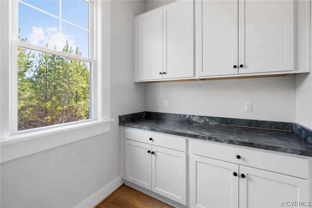 interior space with hardwood / wood-style flooring