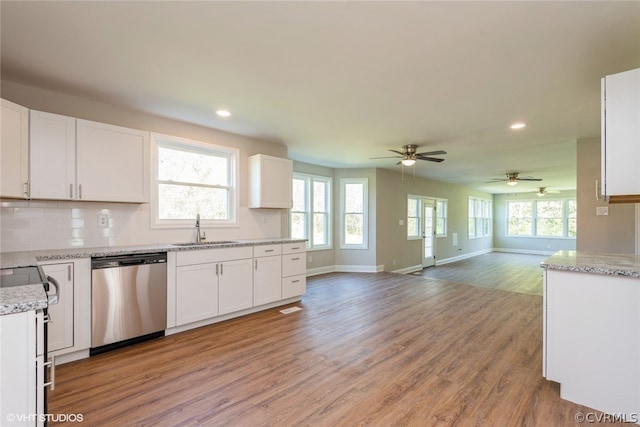 kitchen featuring white cabinets, wood-type flooring, dishwasher, and ceiling fan