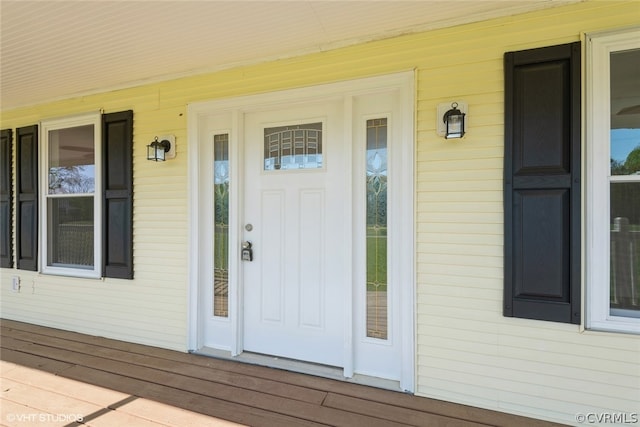 property entrance with a porch