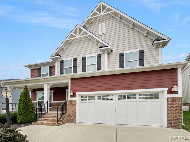 craftsman-style home with a porch and a garage