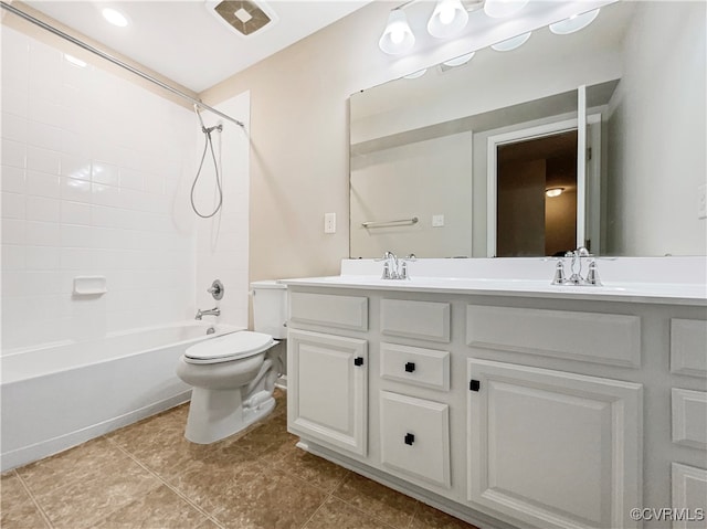 full bathroom featuring vanity, tile patterned flooring, toilet, and shower / bathtub combination