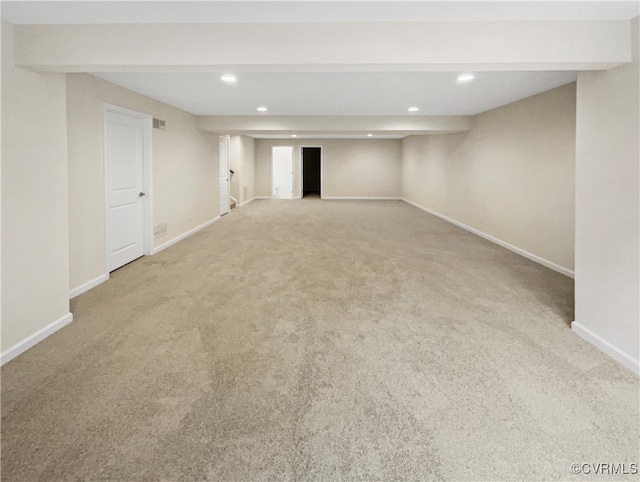 basement featuring carpet flooring