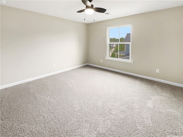 carpeted empty room with ceiling fan