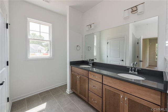 bathroom featuring vanity and tile patterned flooring