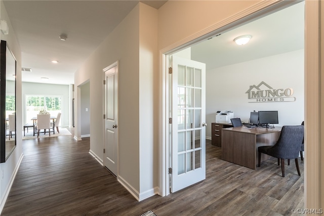 office featuring dark hardwood / wood-style flooring and french doors