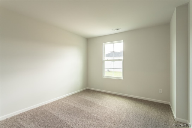 empty room featuring carpet floors