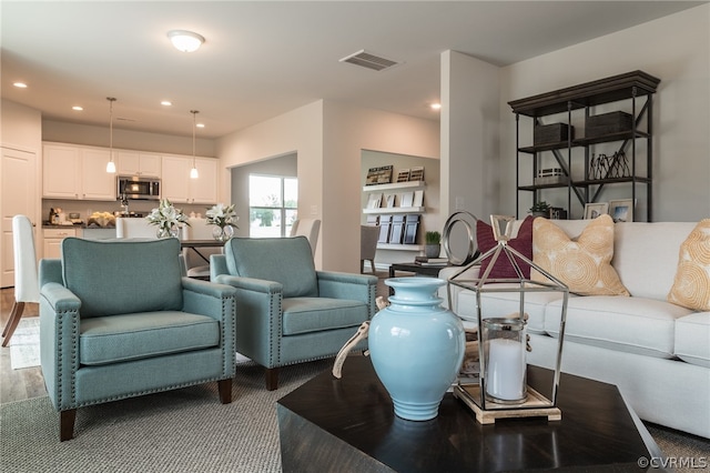 living room featuring hardwood / wood-style flooring