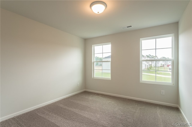 view of carpeted spare room