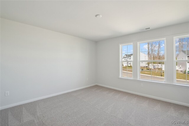 233 Bellevue Cir, King William, VA 23009 - empty room featuring baseboards and light colored carpet