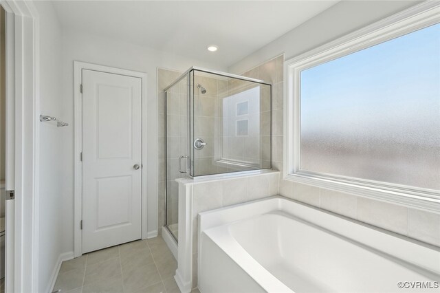 233 Bellevue Cir, King William, VA 23009 - full bath featuring a shower stall, a garden tub, tile patterned floors, and recessed lighting