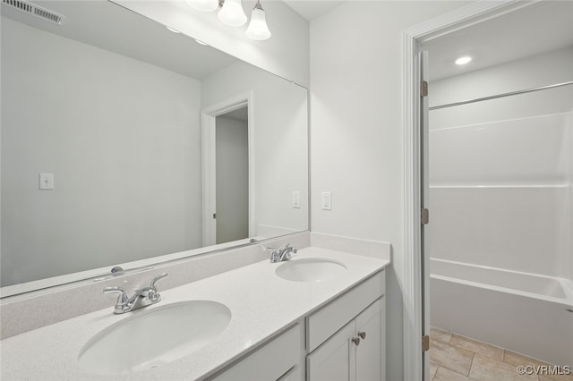 233 Bellevue Cir, King William, VA 23009 - full bathroom with double vanity and  shower combination