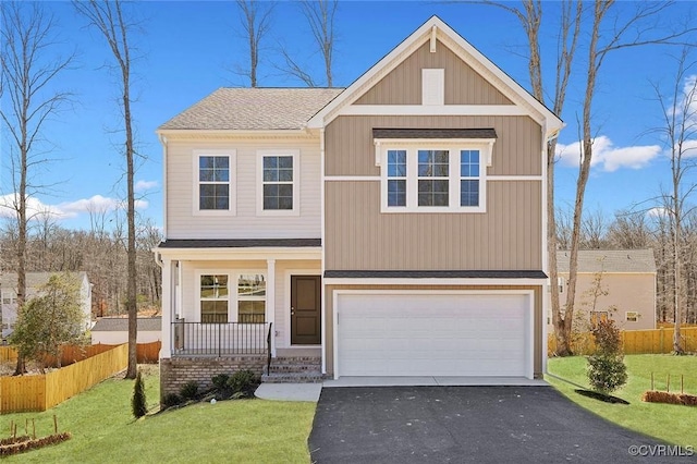 233 Bellevue Cir, King William, VA 23009 - view of front facade with a porch, a garage, driveway, and a shingled roof