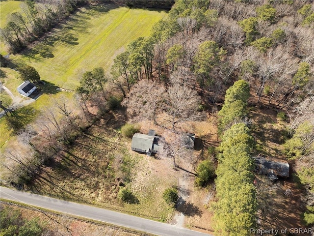 birds eye view of property with a rural view