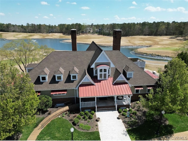 drone / aerial view with a water view