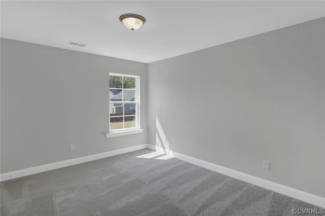 unfurnished room featuring carpet floors