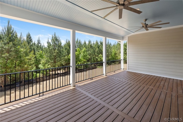 wooden terrace featuring ceiling fan