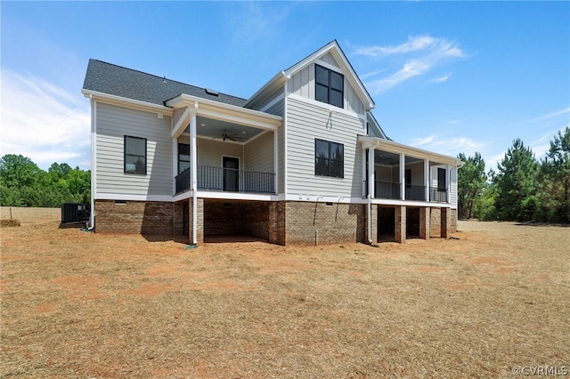 back of house featuring ceiling fan and central air condition unit