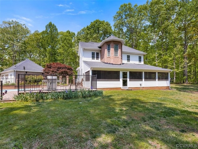 view of front of home featuring a front yard