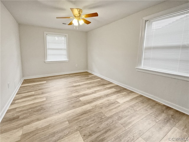 unfurnished room with light hardwood / wood-style floors and ceiling fan