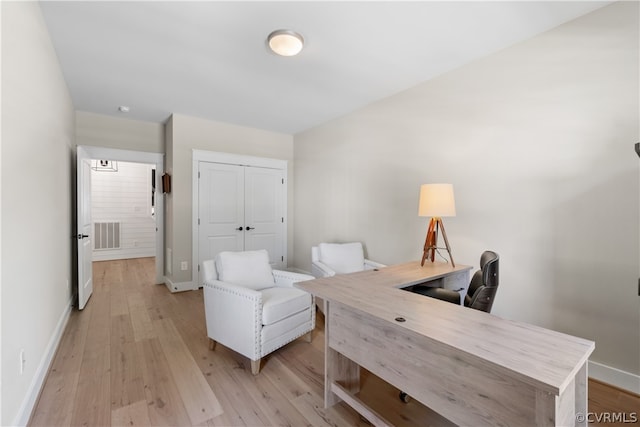 home office featuring light hardwood / wood-style floors