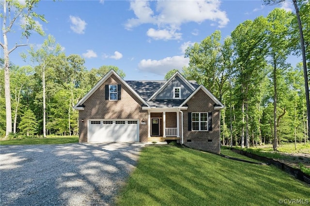 view of front of home featuring a garage and a front lawn