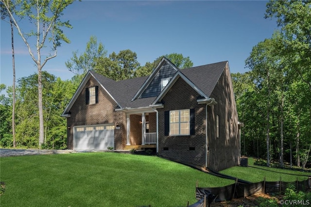 view of front of property with a garage and a front lawn