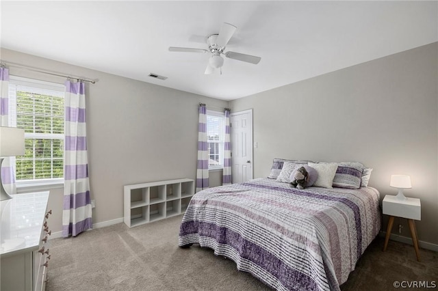 bedroom featuring ceiling fan and carpet flooring