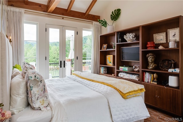 bedroom with beamed ceiling, french doors, and access to outside