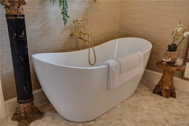 bathroom with tile flooring