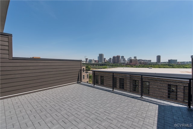 view of patio / terrace with a balcony