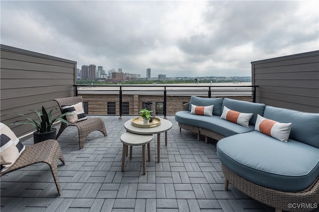 view of patio / terrace with a city view and outdoor lounge area