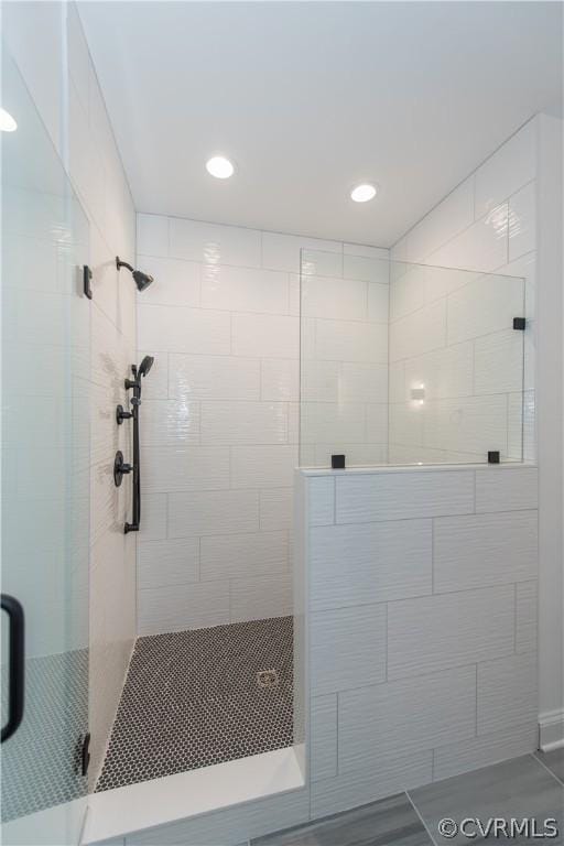 bathroom featuring a shower stall