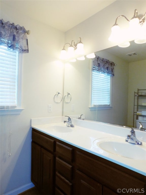 bathroom featuring double sink vanity