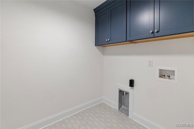 washroom featuring cabinets and hookup for a washing machine