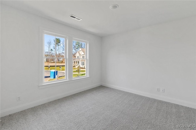 unfurnished room with carpet